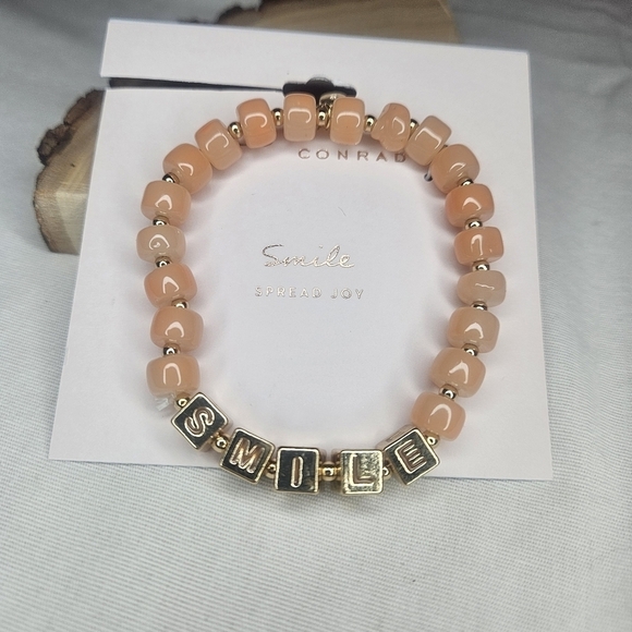 Lauren Conrad Gold Tone Metal And Peach Glass Bead Stretch Smile Bracelet - Picture 2 of 5